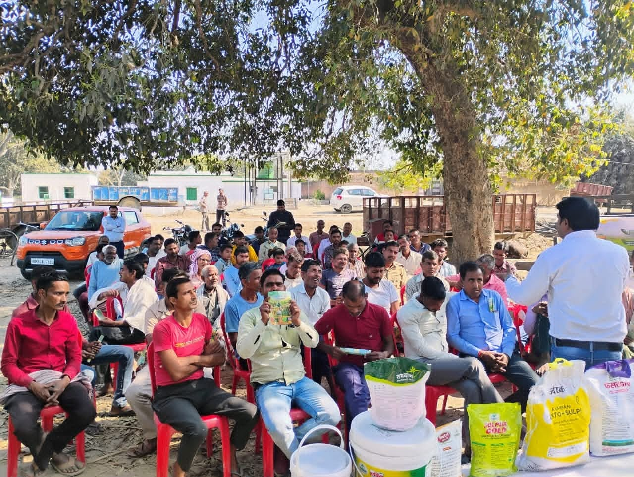 Farmers gathered at a village awareness meeting of the society