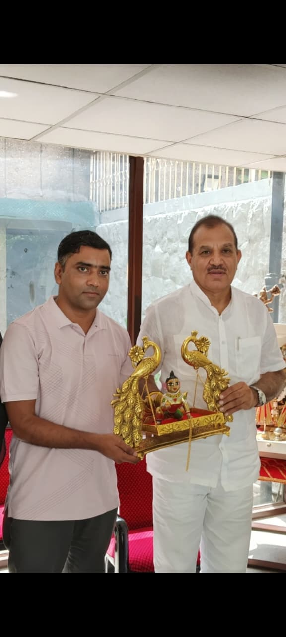 Society representative being honoured at an official meeting