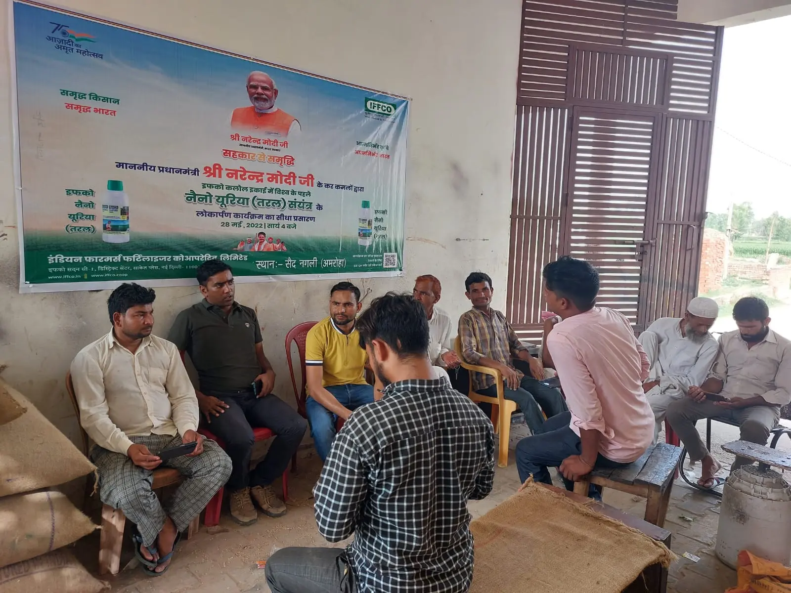 Village gathering during a cooperative agricultural programme